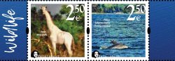 Finland 2020 Fauna Wild life "Memorable facts" White giraffe and Bottlenose dolphin Peterspost strip of 2 stamps MNH
